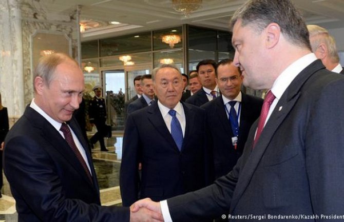 Minsk: Putin i Porošenko - ruka ruci