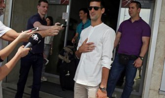 Novak i Jelena stigli u Beograd (FOTO)  