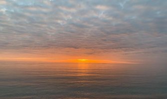 Oblačno, mjestimično kiša