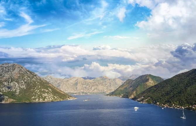 Oblačno sa kišom, krajem dana prestanak padavina